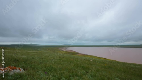 Russia, time lapse. The movement of clouds in the spring in the steppe part of the Crimea peninsula at Cape Opuk.
 photo