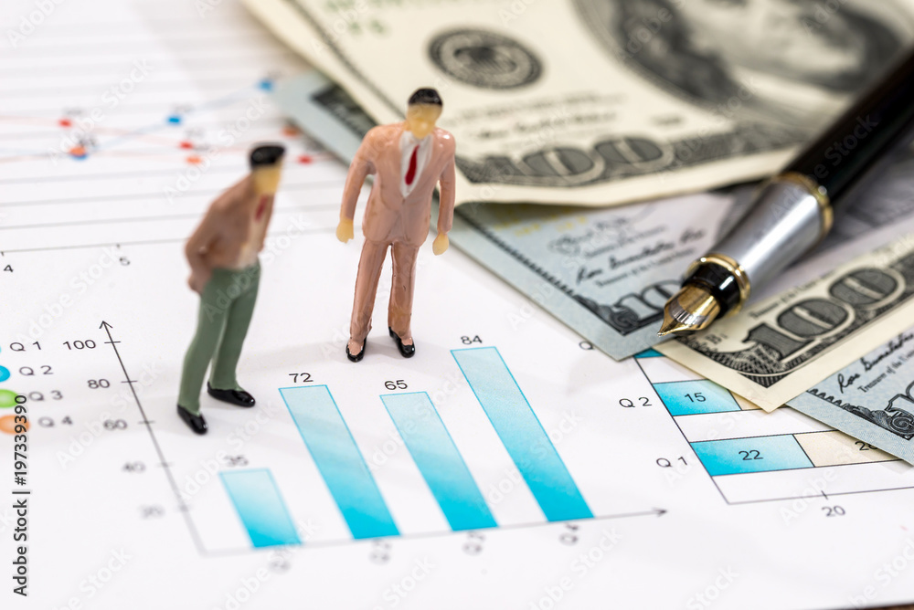 Small toys people discuss the schedule and dollars Small toys people discuss the schedule and dollars