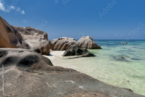Anse Source d'Argent - granite rocks at beautiful beach on tropical island La Digue in Seychelles