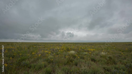 Russia, time lapse. The movement of clouds in the spring in the steppe part of the Crimea peninsula at Cape Opuk.
 photo