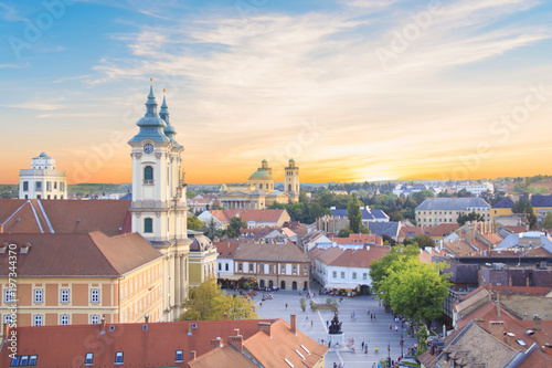 Beautiful view of the Minorit church and the panorama of the city of Eger, Hungary, at sunset photo