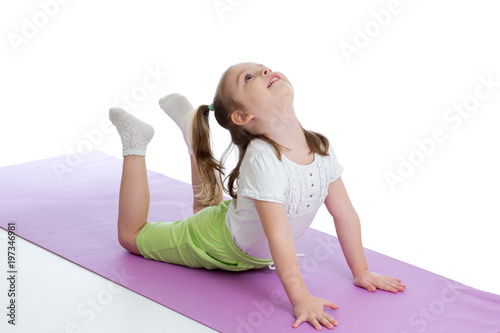 Child girl doing an exercis...