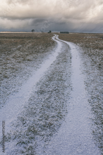 Road to the horizon in the snow photo