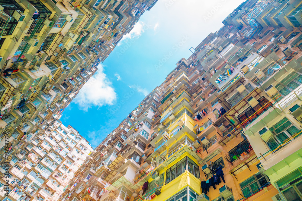 Old residential building under blue sky at Quarry Bay, Hong Kong