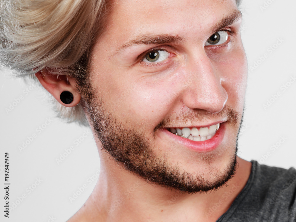 Fototapeta premium Happy smiling blonde man close up