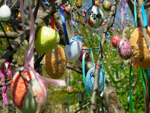 Decorative tree decorated with decorated Easter eggs. National Tadic. Christian Orthodox religious festival.  photo