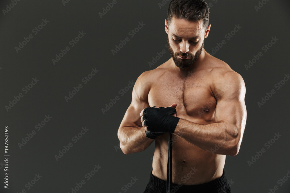 Portrait of a strong shirtless muscular sportsman