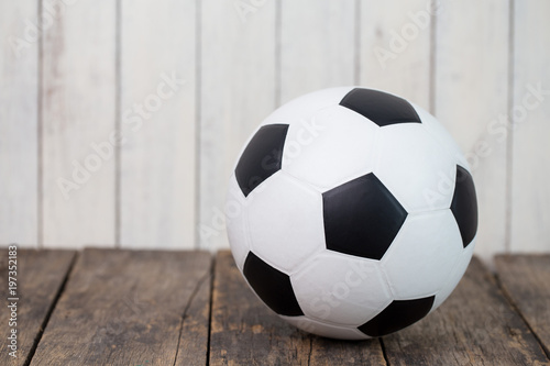 soccer ball isolated on wooden background.