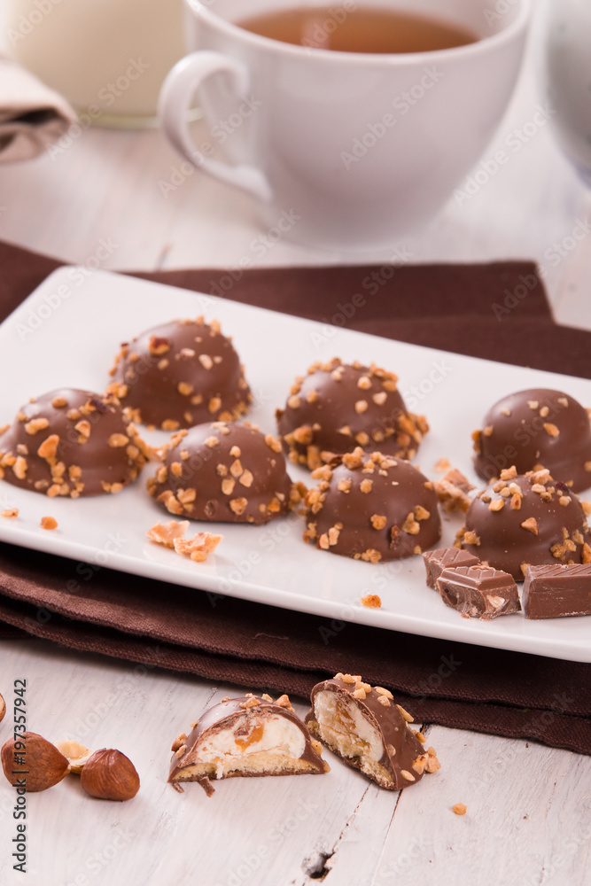 Chocolate truffles with caramel cream filling. Chocolate truffles with caramel cream filling.