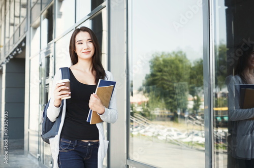 Beautiful student girl with textbooks and coffee Free Download Beautiful student girl with textbooks and coffee - GFXLoad
