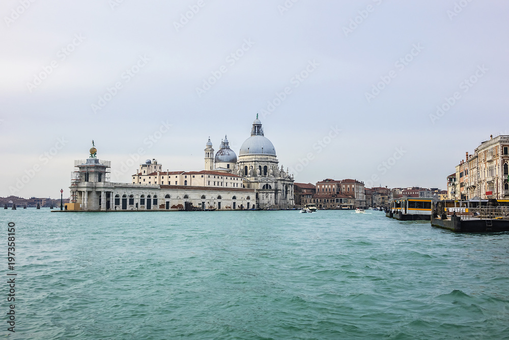 Seaview of Grand Canal and famous Basilica Santa Maria della Salute (1687). Venice, Italy.