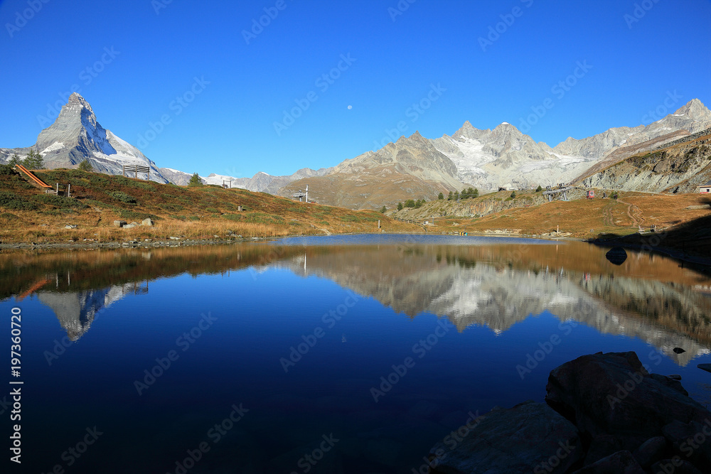 Morning scenery of Mountain Matterhorn and symmetric reflections on the smooth water of Lake Leisee at Sunnegga Paradise, Zermatt, Switzerland, Europe ~ Scenic view of pure and magnificent Swiss Alps