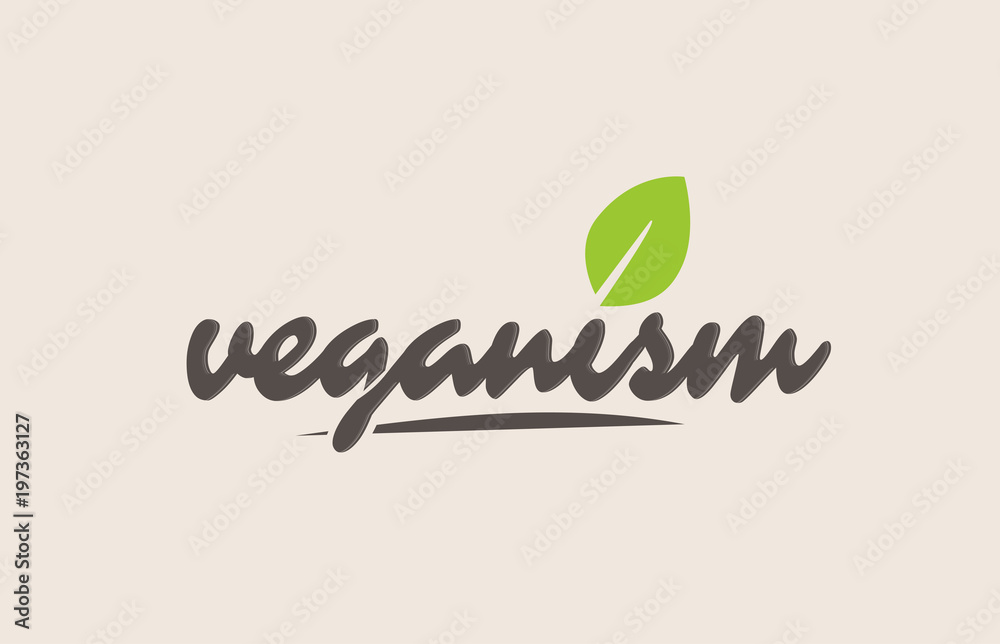 Fototapeta premium veganism word or text with green leaf. Handwritten lettering