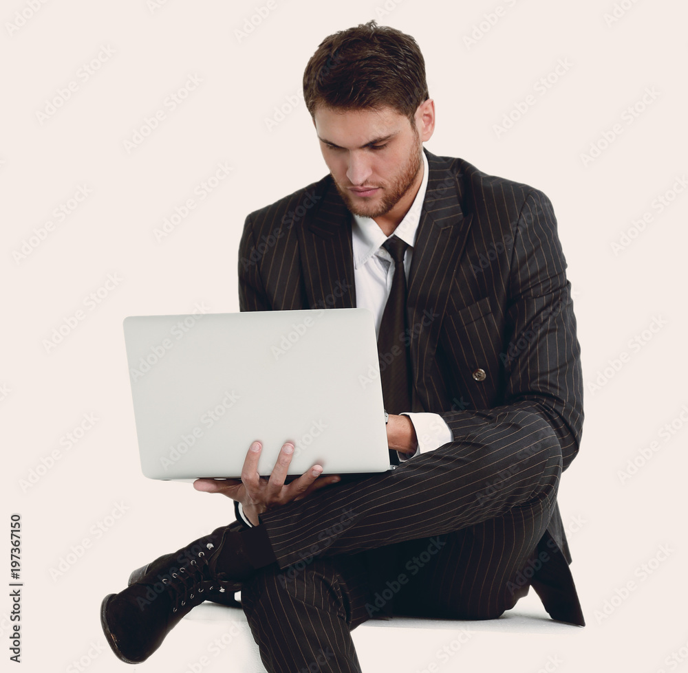handsome businessman with a laptop