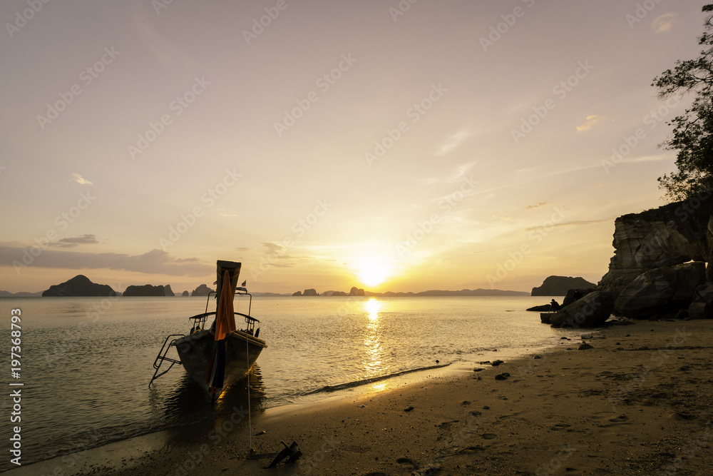 Fishing boat on the background of the beautiful sunset Colorful Krabi island The island of Thailand The rest of paradise Relaxation