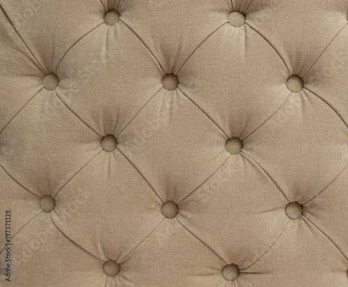 Background and texture with beige cloth for the sofa