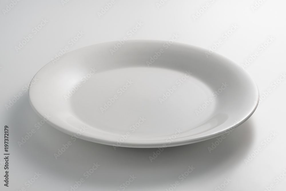 Empty white round plate Empty white round plate