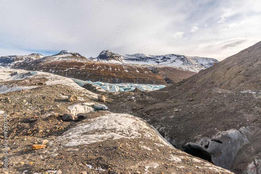Fototapeta premium Mountains near entrance of ice cave in Iceland