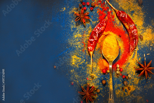 Fototapeta Naklejka Na Ścianę i Meble -  Wooden table of colorful spices