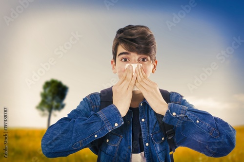 allergy, young sneezing with handkerchief