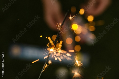 Sparklers and Firewords In the Night photo