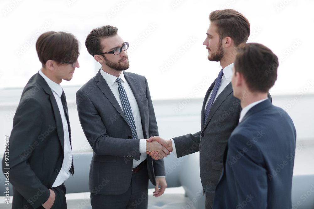 handshake business people in the office. handshake business people in the office.
