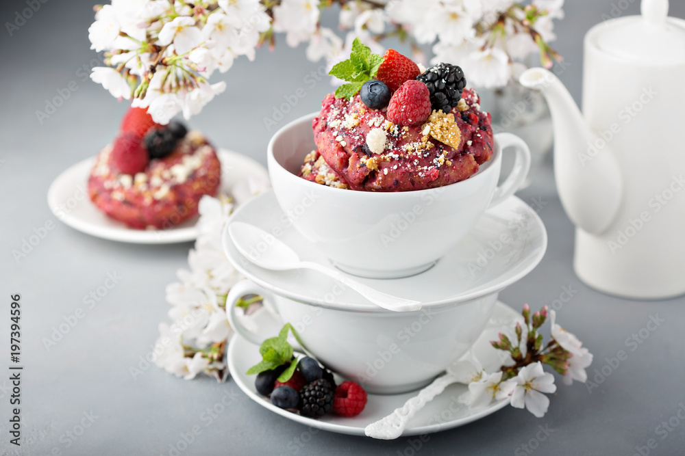 Berry shortcake donuts in a white cup Berry shortcake donuts in a white cup