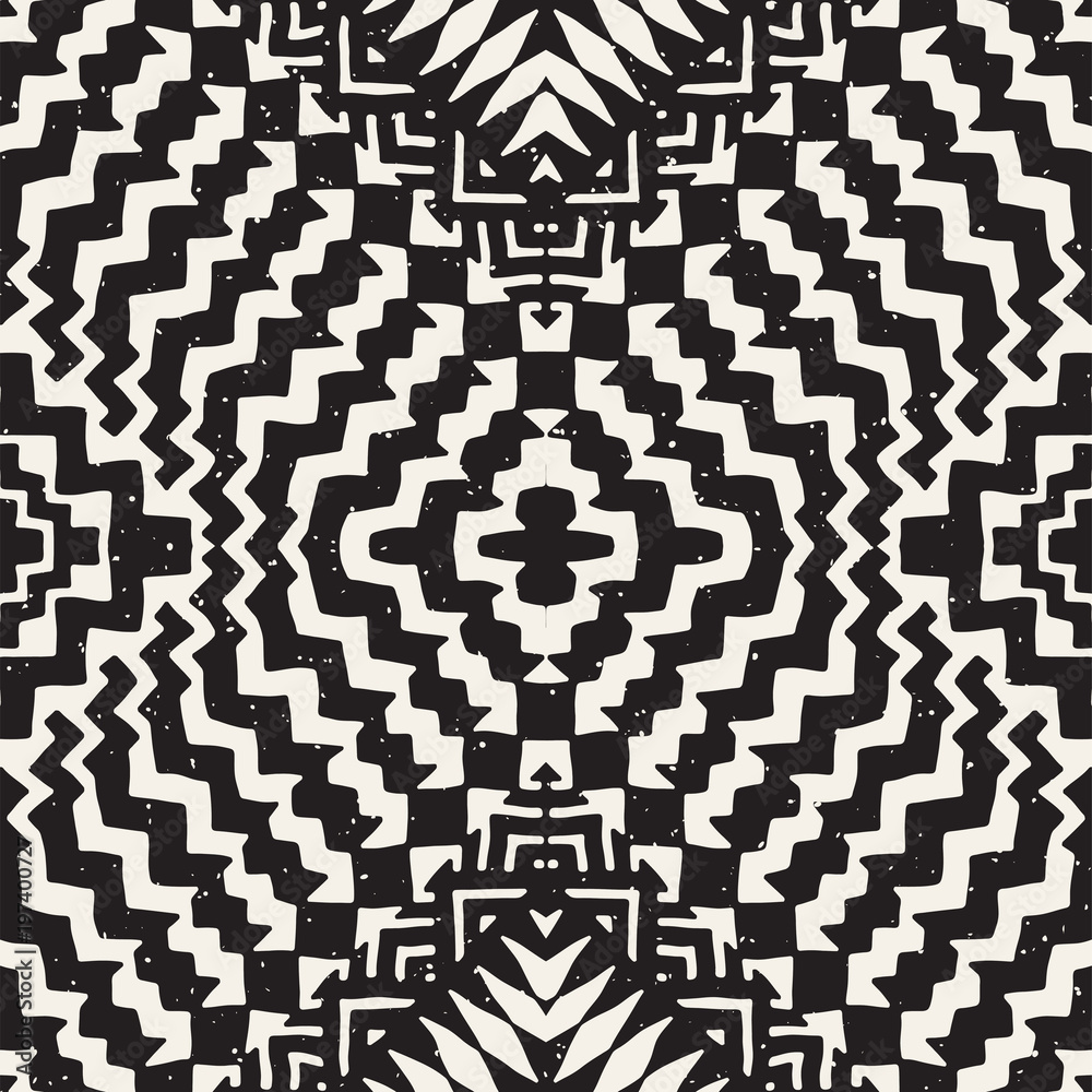 Seamless ethnic and tribal pattern. Hand drawn ornamental stripes. Black and white print for your textiles. Vector background.