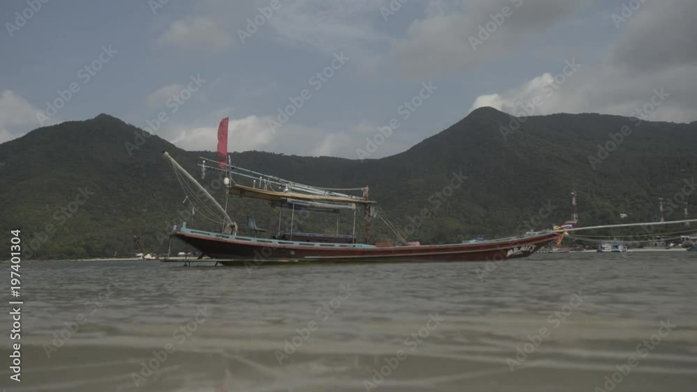 Tropical Thai jungle lake Cheo lan wood boat, wild mountains nature national park ship yacht rocks Tropical Thai jungle lake Cheo lan wood boat, wild mountains nature national park ship yacht rocks