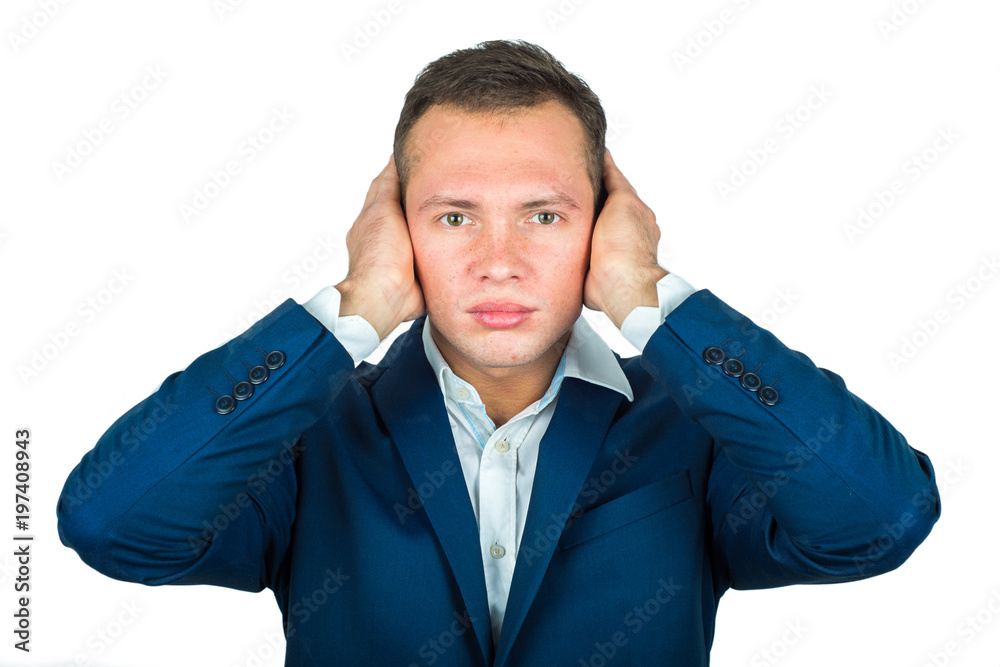 A young businessman covered his ears with his hands. I can not hear the concept A young businessman covered his ears with his hands. I can not hear the concept