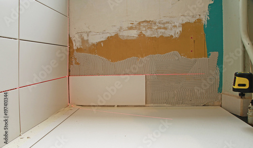 Photography Pose de carrelage avec niveau laser
