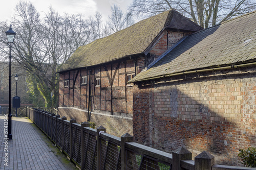 Old buildings by the River Wey in central Alton, UK.