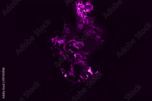 Violet flame. Fire. Burning of rice straw at night.