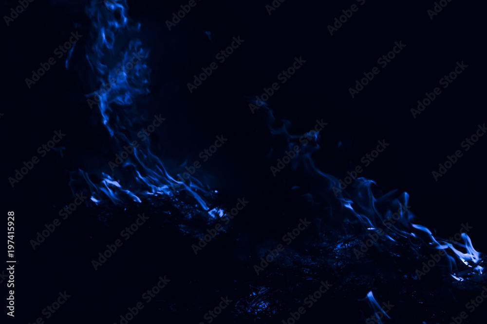 Blue flame. Fire. Burning of rice straw at night. Blue flame. Fire. Burning of rice straw at night.