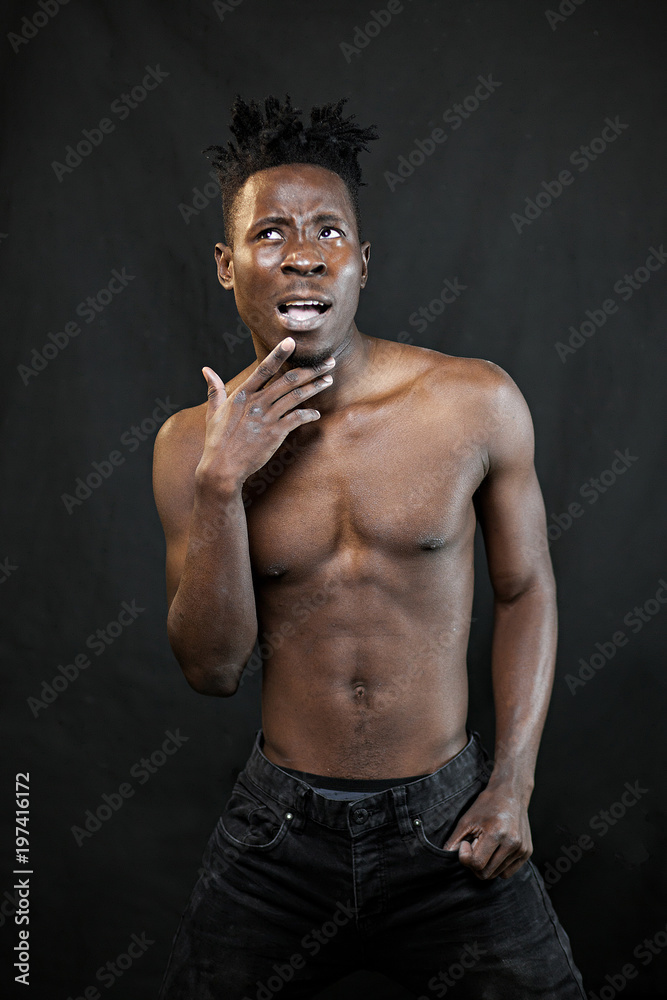Obraz premium emotions black young man on a black background