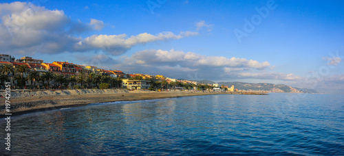The beach and the promenade of Loano resort in Liguria, Italy photo