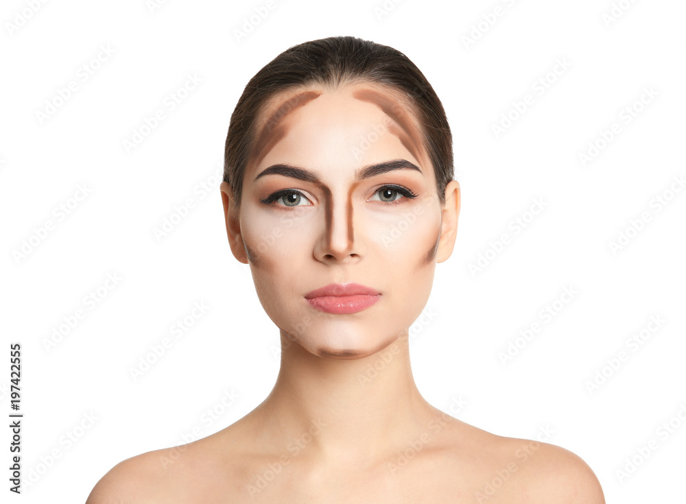Young woman with contouring lines on her face against white background. Professional makeup products Young woman with contouring lines on her face against white background. Professional makeup products