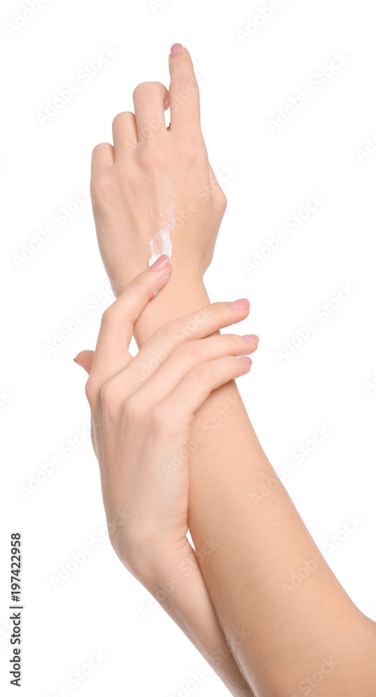 Young woman applying body cream on white background Young woman applying body cream on white background