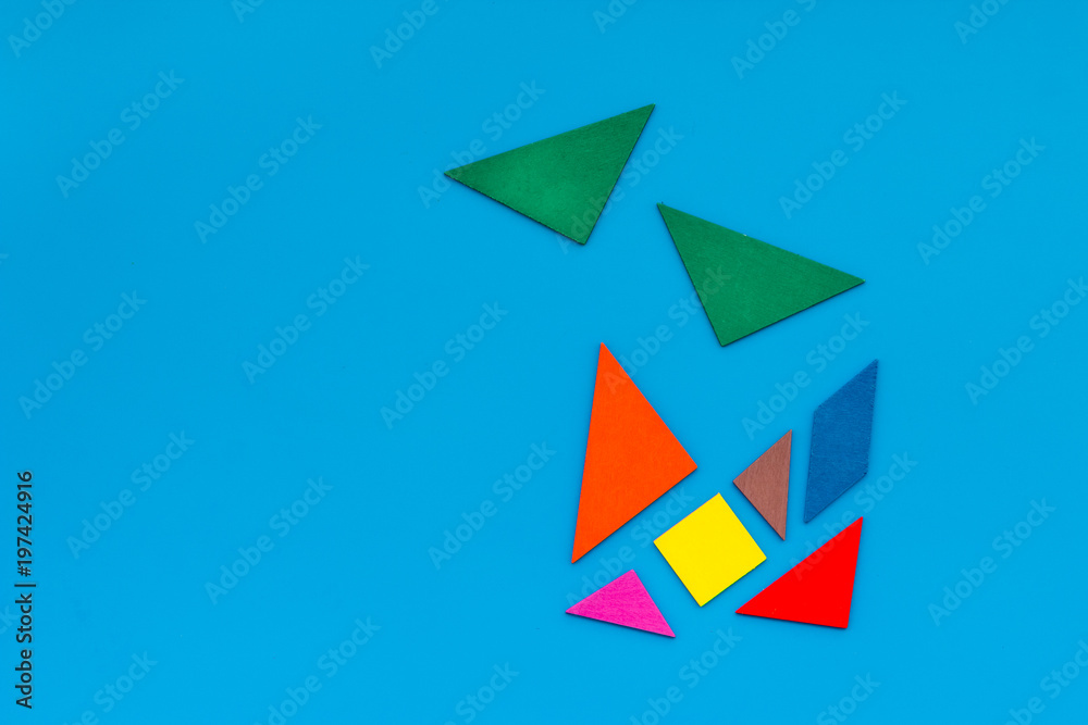 pieces of bright paper for puzzle on blue office background top view mockup pieces of bright paper for puzzle on blue office background top view mockup