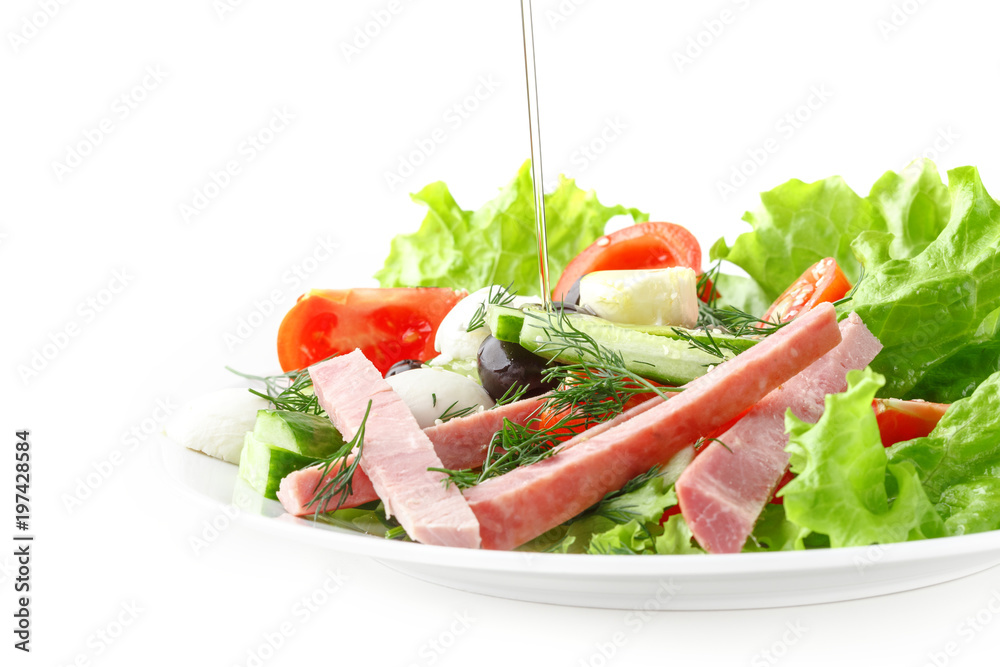 Fresh vegetable salad in a plate. Restaurant serving. Isolated. Fresh vegetable salad in a plate. Restaurant serving. Isolated.