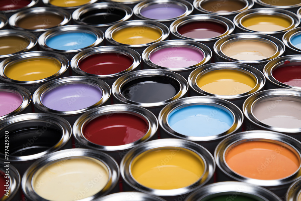 Buckets full of rainbow colored oil paint Buckets full of rainbow colored oil paint