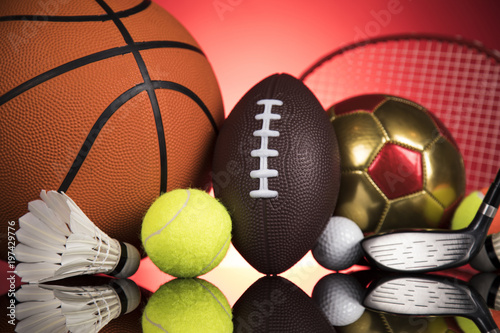 Sports balls with equipment