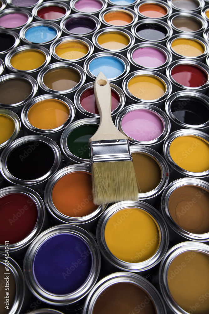 Fototapeta premium Colorful paint cans with paintbrush