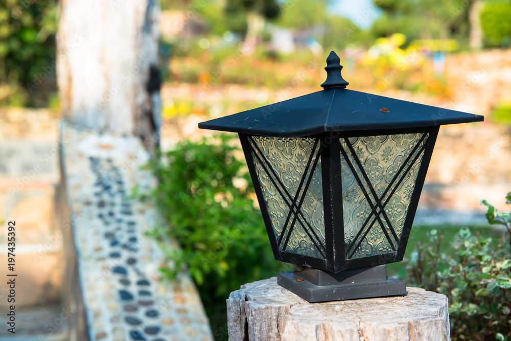 The garden lantern of the background lawn.