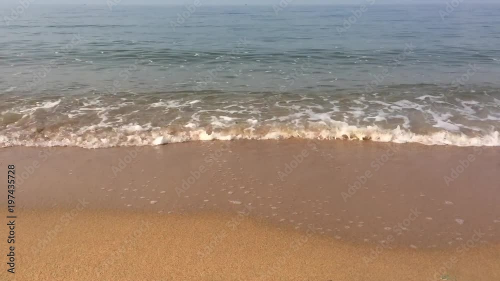 Small waves on the beach at early morning, gulf of Thailand. Small waves on the beach at early morning, gulf of Thailand.
