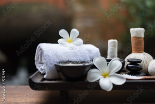 Spa massage compress balls  herbal ball on the wooden with treaments spa   Thailand  select focus.