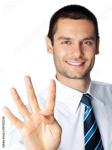 Businessman showing four fingers, isolated