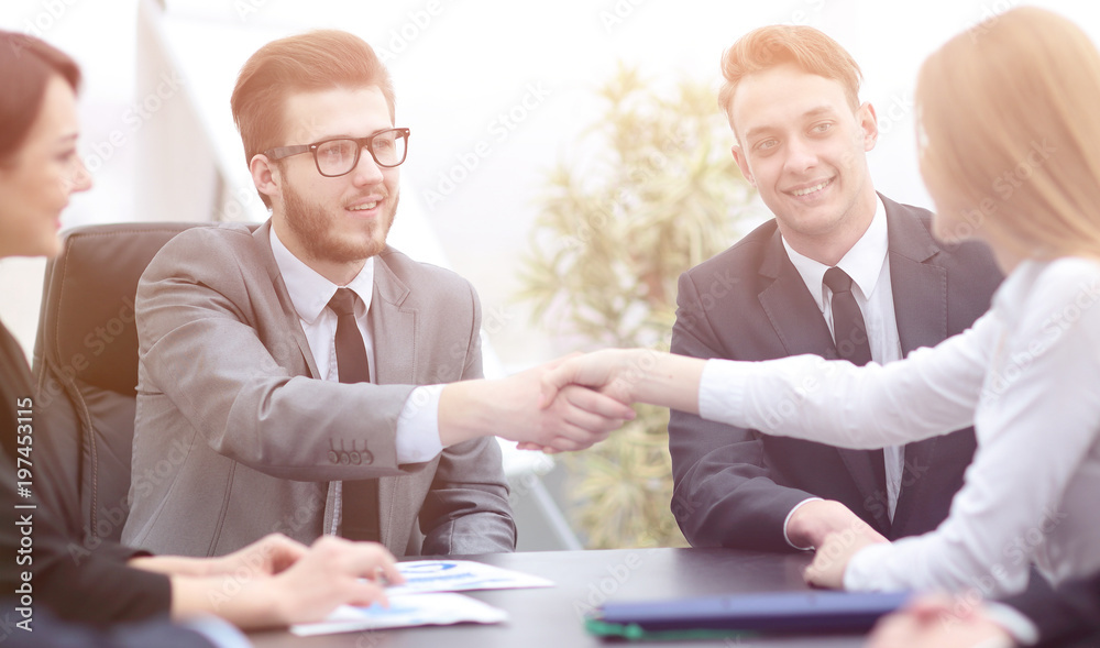 Fototapeta premium handshake of business people in office