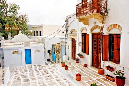 Street scenery at the old village of Pyrgos in Tinos island, Cyclades, Greece. photo