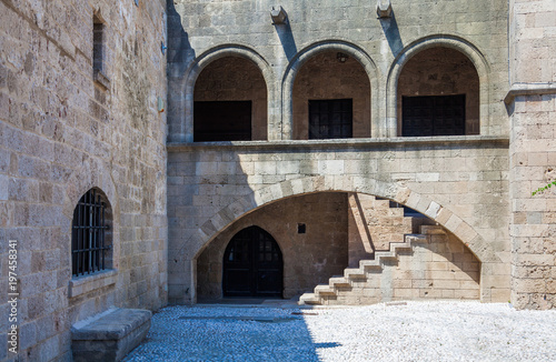 Archs and stone staircase in the house on the  Argyrokastrou square, Rhodes island, Greece